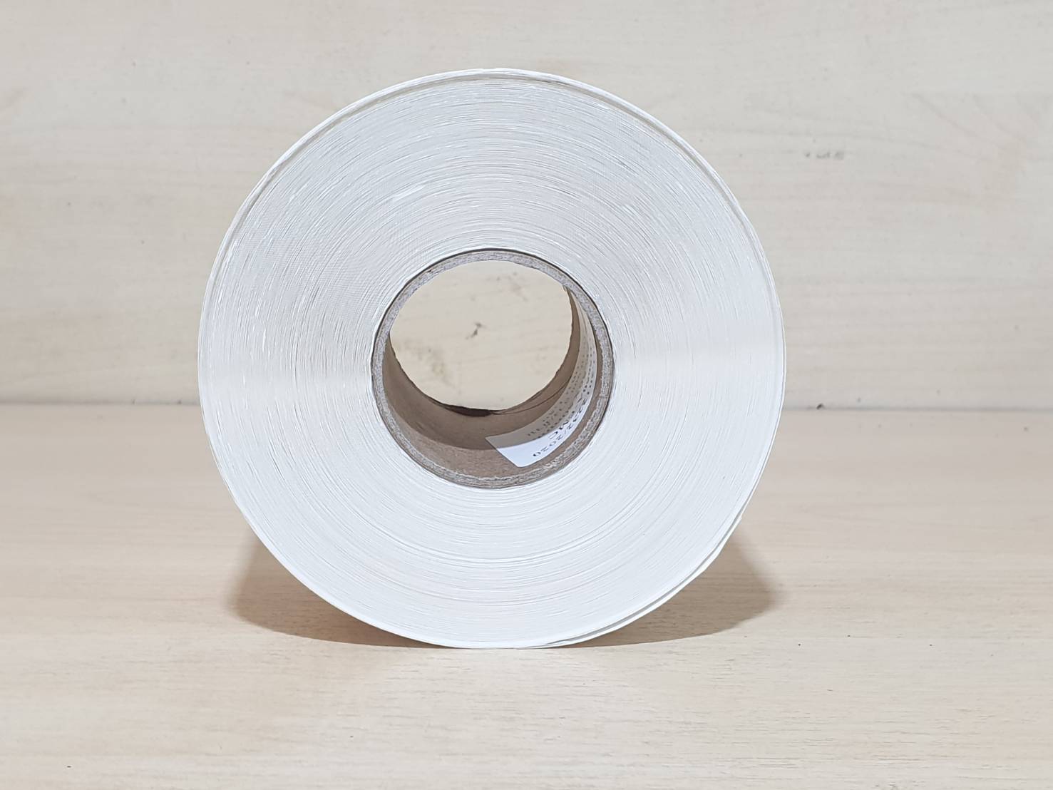 สติ๊กเกอร์เครื่องชั่ง 56x50 mm. แกน 1.5" 900ดวง/ม้วน