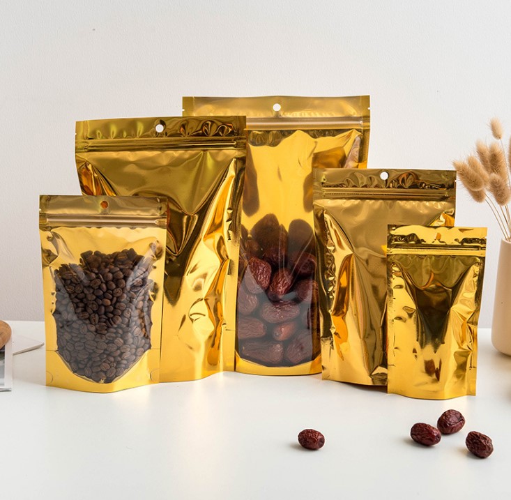 ถุงฟอยล์ซิปล็อคตั้งได้ หน้าใสหลังฟอยล์สีทอง (เมทัลไลท์)