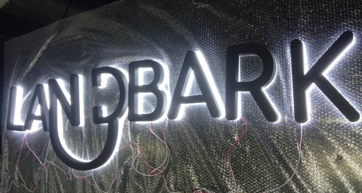 งานป้ายอักษรซิงค์ทำสีไฟออกหลัง