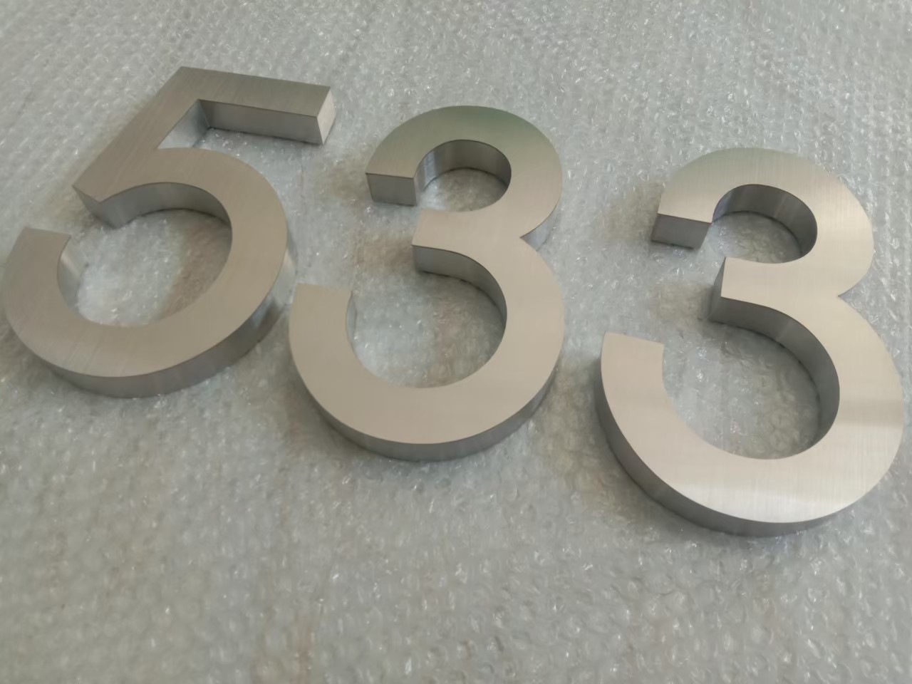 งานป้ายบ้านเลขที่ 533