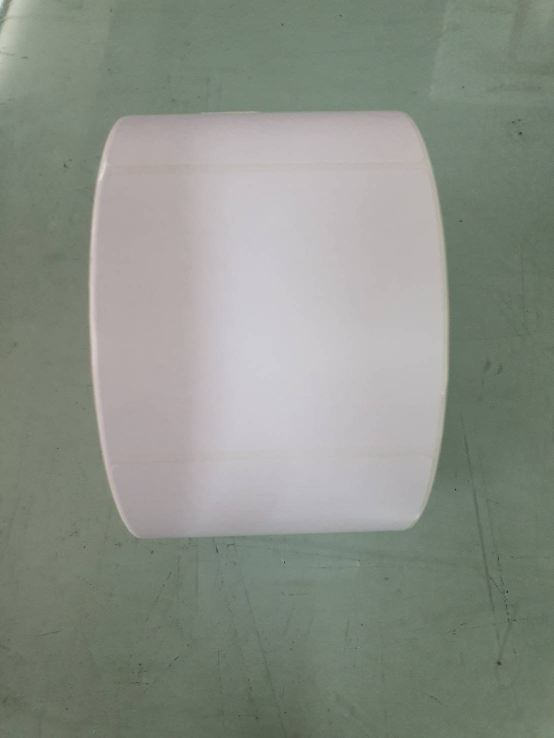 สติ๊กเกอร์เครื่องชั่ง 56x50 mm. แกน 1.5" 900ดวง/ม้วน