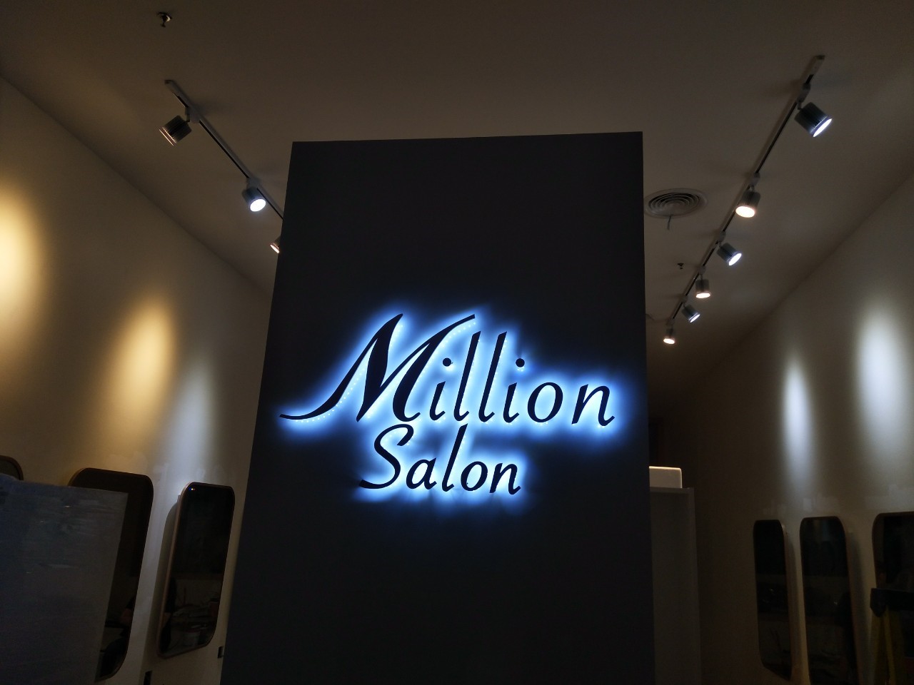 ป้ายไฟออกหลัง สแตนเลส Pink Gold ติดบนอะคริลิคไดคัท - Million Salon