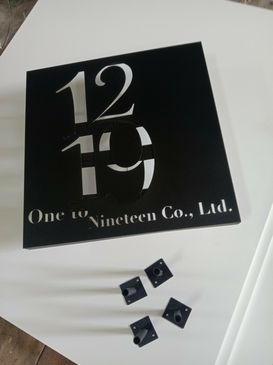 งานป้ายบ้านเลขที่_1219 One to Nineleen Co.,Ltd.