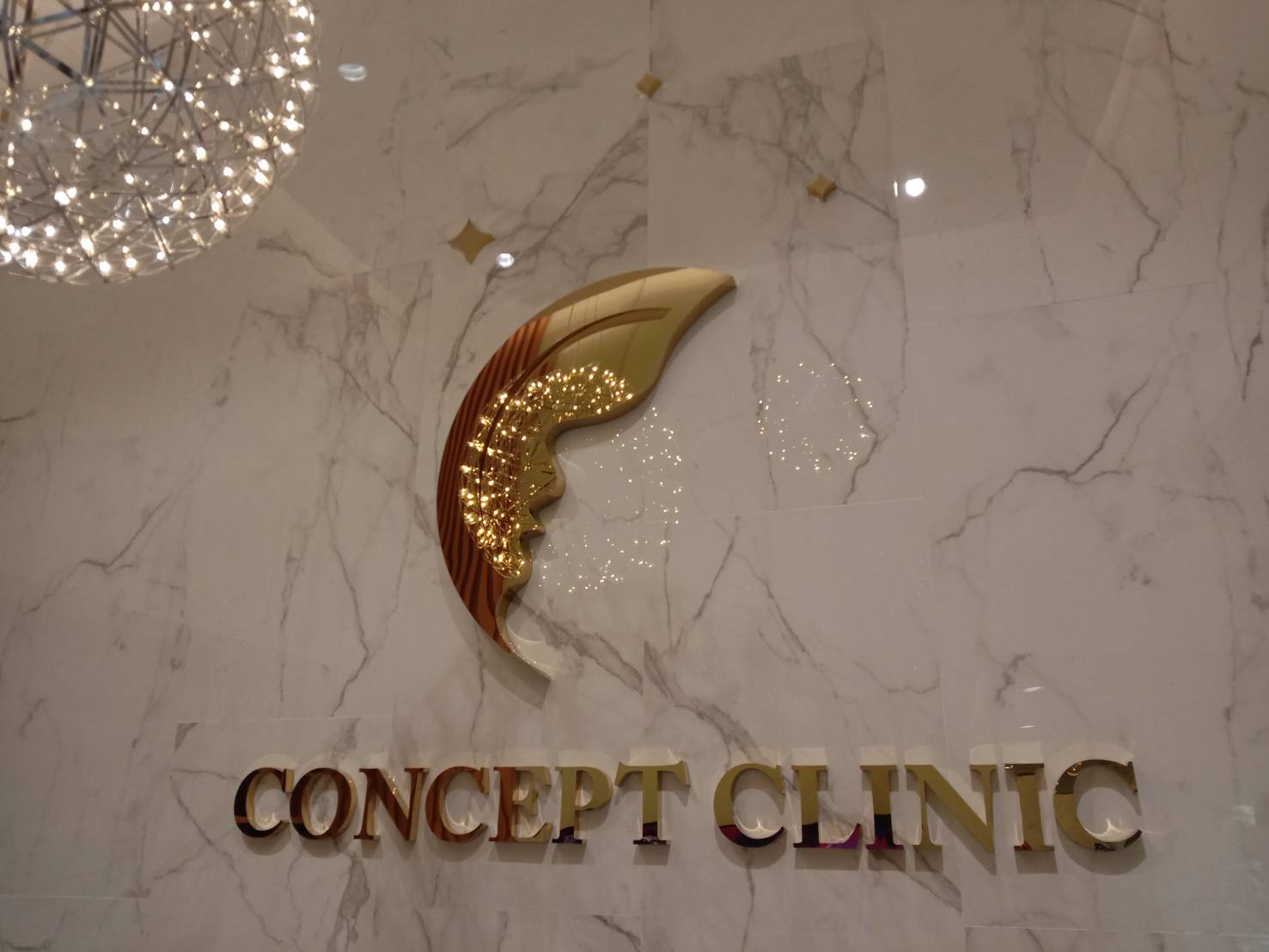 โลโก้ อักษรแสตนเลสหน้าทองเงา - CONCEPT CLINIC