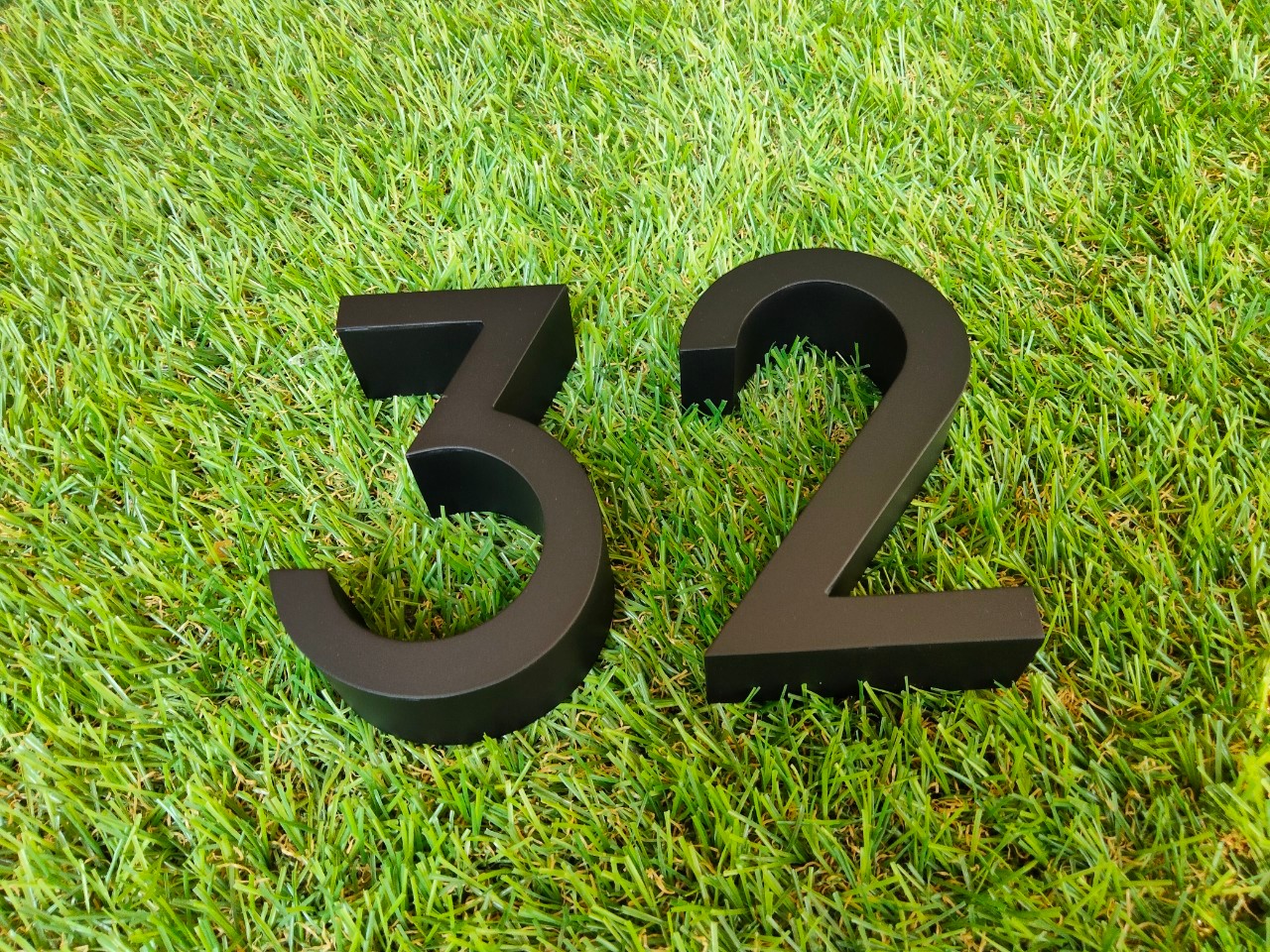 งานป้ายบ้านเลขที่ 32