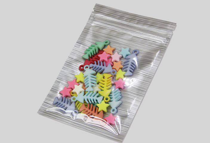 ถุงหน้าใส หลังฟอยล์สี ลายเส้น ซิปล็อคตั้งไม่ได้ (เมทัลไลท์)