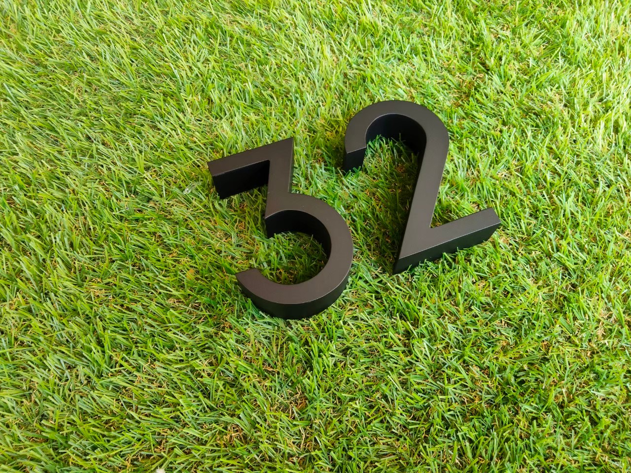 งานป้ายบ้านเลขที่ 32