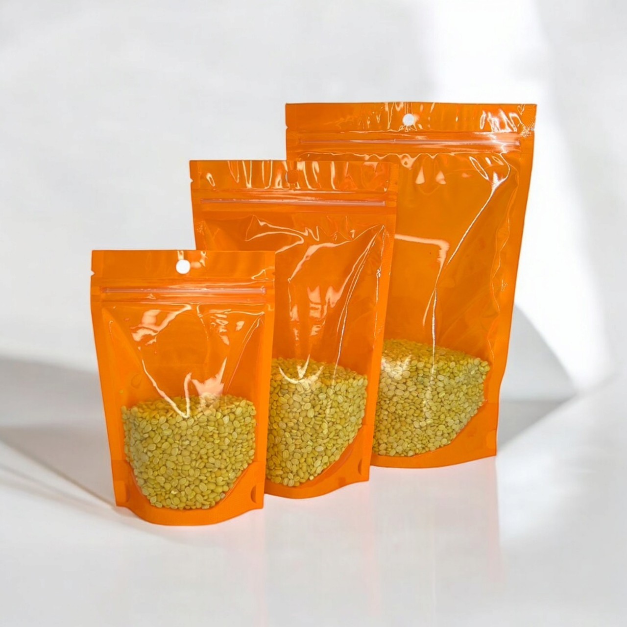 ถุงหน้าใสหลังพลาสติกสี ซิปตั้งได้