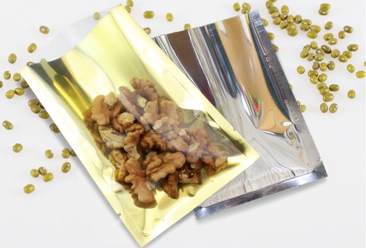 ถุงแบนหน้าใส หลังฟอยล์ทอง ซีล 3 ด้าน (เมทัลไลท์)