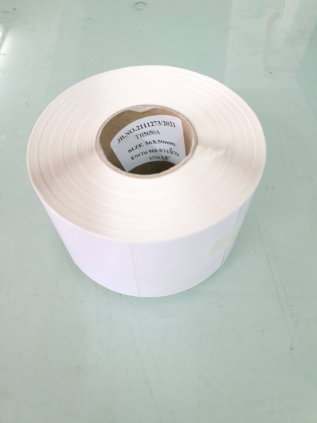 สติ๊กเกอร์เครื่องชั่ง 56x50 mm. แกน 1.5" 900ดวง/ม้วน