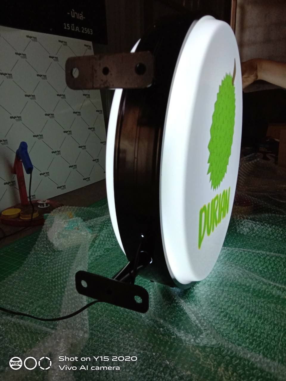 งานป้ายกล่องไฟวงกลมไฟออกทั้ง 2 ด้าน ขอบซิงค์พ่นสีดำ - DURIAN