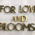 งานอักษรทองเหลือง