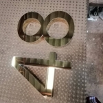 ตัวอักษรสแตนเลสยกขอบ เนื้อทอง - 84